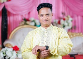 pexels-photo-27833159-27833159 Man in traditional attire at a festive event in Bangladesh.